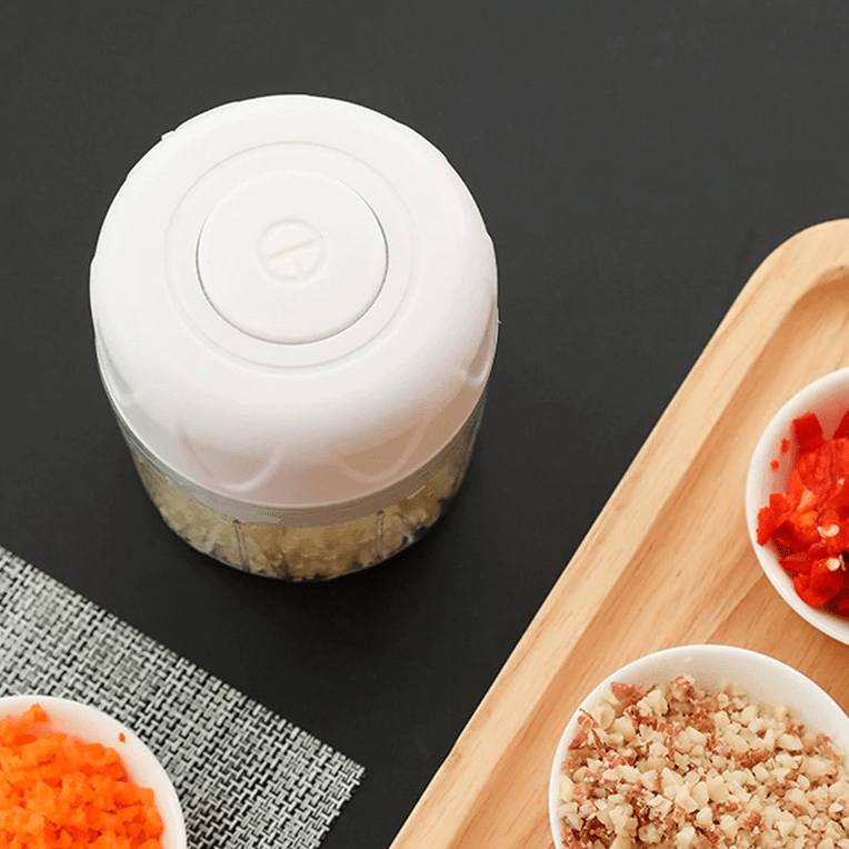 https://topsmartproducts4u.com/cdn/shop/products/smart-all-in-one-wireless-portable-food-chopper-mincer-29120980091066_1200x.png?v=1628117808